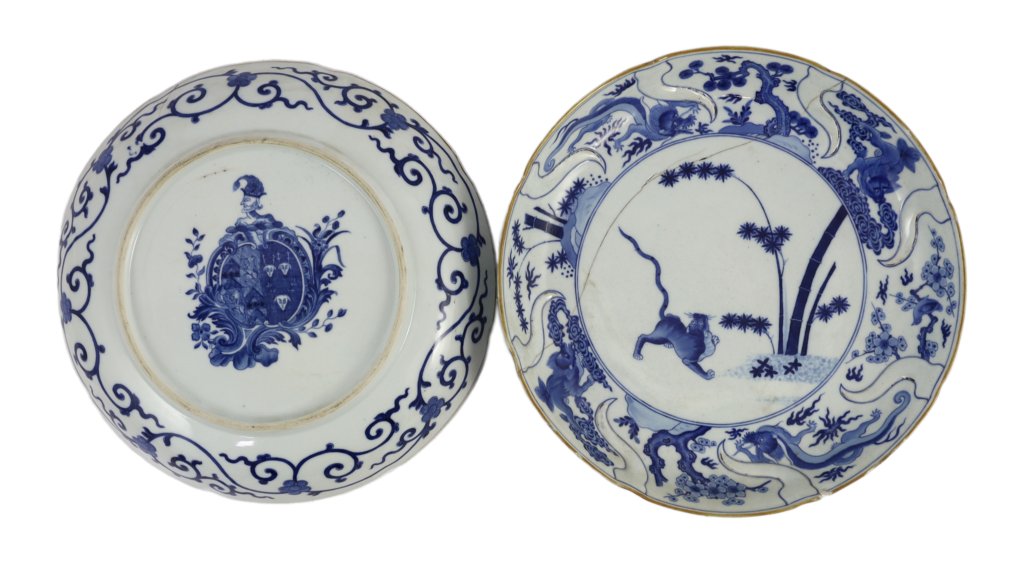 A pair of Chinese blue and white armorial dishes in Japanese Kakiemon style, Qianlong period, c.1752